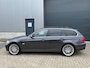 BMW 3-Serie Touring 335xi High EXE AUT NAVI XENON PDC