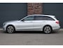 Mercedes-Benz C-klasse Estate 180 Ambition | Dodehoekassistent | Trekhaak | Leder | Nightpakket | Navigatie | Stoelverwarming | Intelligent Light System | Zitcomfortpakket |