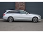 Mercedes-Benz C-klasse Estate 180 Ambition | Dodehoekassistent | Trekhaak | Leder | Nightpakket | Navigatie | Stoelverwarming | Intelligent Light System | Zitcomfortpakket |