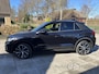 Volkswagen T-Roc DSG 1.5 TSI DSG R-LINE EDITION , PANO , BLACK STYLE , APLLE CARPLY BLINDSPOT , STUUR EN STOEL VERWARMING , KEYLESS ENTRY , ADAPTIVE CRUISE CONTROL , LANE ASSIST , IQ-LICHT , LED , PRYVACY GLASS , 19 INCH