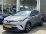 Toyota C-HR / C-HR+ 1.8 Hybrid Bi-Tone | Leder | Stoelverwarming | Zomer + winterbanden | Parkeersensoren voor en achter | Toyota Garantie tot 2028!