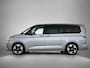 Volkswagen Multivan 1.5 eHybrid L2 Bulli Edition 4Motion 245PK | Automaat | Trekhaak | Elektrische Schuifdeuren | Elektrische Achterklep | Achteruirijcamera | Verwarmbare Voorstoelen | Verwarmbare Voorruit | Trekhaak | 7-Zits Vis-a-Vis | Multifunctioneel Stuurwiel | Verschuifbare Tafel | Adaptive Cruise Controle | Navigatie | IQ.Light | Glazen Panorama Dak |