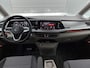 Volkswagen Multivan 1.5 eHybrid L2 Bulli Edition 4Motion 245PK | Automaat | Trekhaak | Elektrische Schuifdeuren | Elektrische Achterklep | Achteruirijcamera | Verwarmbare Voorstoelen | Verwarmbare Voorruit | Trekhaak | 7-Zits Vis-a-Vis | Multifunctioneel Stuurwiel | Verschuifbare Tafel | Adaptive Cruise Controle | Navigatie | IQ.Light | Glazen Panorama Dak |
