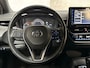 Toyota Corolla 1.8 Hybrid Sport Automaat (NAVIGATIE, CLIMATE, CAMERA, SPORTSTOELEN, ADAPTIVE CRUISE, LM VELGEN, ZWART HEMEL, NIEUWSTAAT)