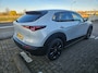 Mazda CX-30 2.5 e-SKYACTIV-G M HYBRID 140PK HOMURA AUTOMAAT / NAVI / CLIMA / FULL-LED / PDC / 18" LMV / KEYLESS / AFN. TREKHAAK / WINTERPAKKET / ADAPT. CRUISECONTROL / 1E EIGENAAR / NIEUWSTAAT !!