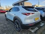 Mazda CX-30 2.5 e-SKYACTIV-G M HYBRID 140PK HOMURA AUTOMAAT / NAVI / CLIMA / FULL-LED / PDC / 18" LMV / KEYLESS / AFN. TREKHAAK / WINTERPAKKET / ADAPT. CRUISECONTROL / 1E EIGENAAR / NIEUWSTAAT !!