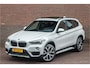 BMW X1 sDrive20i High Executive, 63.000km NAP, Sport Line, Panoramadak, Camera, Trekhaak, Leder, Head-up, Stoelverwarming.