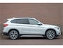 BMW X1 sDrive20i High Executive, 63.000km NAP, Sport Line, Panoramadak, Camera, Trekhaak, Leder, Head-up, Stoelverwarming.