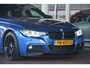 BMW 3-Serie Touring 320d High Executive | M PAKKET | Leer | Sportstoelen | Memory | Schuif kantel dak | Head up display | Stoelverwarming | Camera | lmv | Herman Kardon |