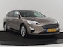 Ford Focus 1.0 EcoBoost Titanium | Stoelverwarming | Trekhaak | Adaptive cruise | Carplay | Keyless | Navigatie | Parkeerhulp | Stuurverwarming | Climate control | Getint glas