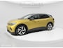 Volkswagen ID.4 First 77 kWh 204pk | Trekhaak | Camera | Warmtepomp | SOH 89,87% | Honey Yellow Metallic