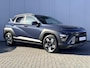 Hyundai Kona 1.6 GDI HEV Comfort Smart / Fabrieksgarantie tot 1-2030 / Stuur- & Stoelverwarming / Adaptief cruise control / Achteruitrijcamera / Climate control / Keyless Entry/Start / Apple Carplay Android Auto / Navigatie / Parkeersensoren voor en achter /