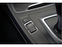 BMW 1-Serie 118i Sport Line Edition | Stoelverwarming | Cruise Control | Parkeersensoren | Navigatie | Groot Scherm | Digitale Tellers | Automaat | Keyless | Trekhaak | LED