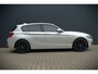BMW 1-Serie 118i Sport Line Edition | Stoelverwarming | Cruise Control | Parkeersensoren | Navigatie | Groot Scherm | Digitale Tellers | Automaat | Keyless | Trekhaak | LED