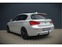BMW 1-Serie 118i Sport Line Edition | Stoelverwarming | Cruise Control | Parkeersensoren | Navigatie | Groot Scherm | Digitale Tellers | Automaat | Keyless | Trekhaak | LED