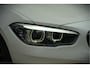 BMW 1-Serie 118i Sport Line Edition | Stoelverwarming | Cruise Control | Parkeersensoren | Navigatie | Groot Scherm | Digitale Tellers | Automaat | Keyless | Trekhaak | LED