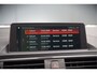 BMW 1-Serie 118i Sport Line Edition | Stoelverwarming | Cruise Control | Parkeersensoren | Navigatie | Groot Scherm | Digitale Tellers | Automaat | Keyless | Trekhaak | LED