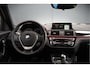 BMW 1-Serie 118i Sport Line Edition | Stoelverwarming | Cruise Control | Parkeersensoren | Navigatie | Groot Scherm | Digitale Tellers | Automaat | Keyless | Trekhaak | LED