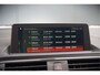 BMW 1-Serie 118i Sport Line Edition | Stoelverwarming | Cruise Control | Parkeersensoren | Navigatie | Groot Scherm | Digitale Tellers | Automaat | Keyless | Trekhaak | LED