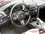 BMW 3-Serie 320i High Executive M-Sport Apple CarPlay | Schuif/Kanteldak | Hifi | Leer | PDC V+A