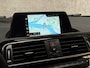 BMW 1-Serie 118i Sport Line Automaat (VIRTUAL COCKPIT, NAVIGATIE, ZWART HEMEL, CLIMATE, PARKEERSENSOREN, SPORTSTOELEN, CRUISE, NIEUWE APK, NIEUWSTAAT)