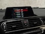 BMW 1-Serie 118i Sport Line Automaat (VIRTUAL COCKPIT, NAVIGATIE, ZWART HEMEL, CLIMATE, PARKEERSENSOREN, SPORTSTOELEN, CRUISE, NIEUWE APK, NIEUWSTAAT)