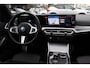 BMW 3-Serie Touring 320e / Panoramadak / Camera / Keyless / Leder / Harman Kardon / 19'' / Elektr. stoelen / CarPlay / Stoelverwarming / ACC / Getint glas