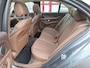 Mercedes-Benz E-klasse 200 Ambition | Panoramadak | Nappaleder bruin | Achteruitrijcamera | Memory pakket | Head-up Display | Stoelverwarming + ventilatie | Sfeerverlichting