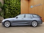 BMW 3-Serie Touring 320e Business Edition Plus | Trekhaak | Panoramadak | Stoelverwarming | Leder