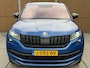 Skoda Kodiaq 1.5 TSI Sportline Business Automaat | Grootscherm navigatiesysteem | Adaptieve cruise control | Voorruitverwarming | Stoelverwarming voor en achter | Canton HiFi | Keyless | Achteruitrijcamera | Parkeersensoren voor en achter