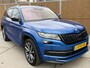 Skoda Kodiaq 1.5 TSI Sportline Business Automaat | Grootscherm navigatiesysteem | Adaptieve cruise control | Voorruitverwarming | Stoelverwarming voor en achter | Canton HiFi | Keyless | Achteruitrijcamera | Parkeersensoren voor en achter
