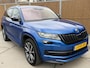 Skoda Kodiaq 1.5 TSI Sportline Business Automaat | Grootscherm navigatiesysteem | Adaptieve cruise control | Voorruitverwarming | Stoelverwarming voor en achter | Canton HiFi | Keyless | Achteruitrijcamera | Parkeersensoren voor en achter