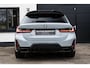 BMW 3-Serie Touring 330e xDrive M stoel Pano H&K HUD Carbon