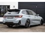 BMW 3-Serie Touring 330e xDrive M stoel Pano H&K HUD Carbon