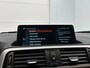 BMW 1-Serie 118i High Executive (GROOT-NAVIGATIE, LEDER, STOELVERWARMING, PARKEERSENSOREN, DEALER ONDERHOUDEN)