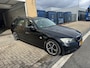 BMW 3-Serie 318i High Executive LEER AIRCO NAVI ANDROID 17INCH TREKHAAK