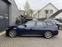 BMW 3-Serie Touring 320i High Executive M-Sport | Panoramadak | Camera | Head-Up Display | DAB |