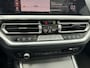 BMW 3-Serie Touring 320i High Executive M-Sport | Panoramadak | Camera | Head-Up Display | DAB |
