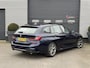 BMW 3-Serie Touring 320i High Executive M-Sport | Panoramadak | Camera | Head-Up Display | DAB |