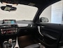 BMW 1-Serie M140i xDrive Executive - M Sport - Pano - Leder - Navi