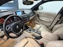 BMW 1-Serie M135i xDrive Business / RIJDT SCHAKELT GOED / DEALER ONDERHOUDEN / AUTOMAAT