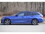BMW 3-Serie Touring 330i xDrive High Executive M-pakket | Pano | HUD | 19" | Laser | Keyless | Hifi | Camera | DAB | Elektr. stoel + mem | Alarm kl.3 | Etc.