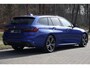 BMW 3-Serie Touring 330i xDrive High Executive M-pakket | Pano | HUD | 19" | Laser | Keyless | Hifi | Camera | DAB | Elektr. stoel + mem | Alarm kl.3 | Etc.