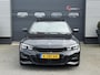 BMW 3-Serie Touring 320i High Executive M-Sport | Panoramadak | Camera | Head-Up Display | DAB | Stoelverwarming | Elektrische Achterklep |