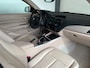 BMW 1-Serie 114i EDE High Executive|Leder|Schuif-Kanteldak