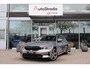BMW 3-Serie Touring (g21) 330e High Executive 292pk | Leder | Stoelverwarming | Laser LED | Sfeer | Cruise | Climate