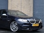 BMW 5-Serie Touring M550d xDrive M Sport | HUD | ACC | Harman/Kardon | Softclose | Pano | Comfortstoelen |