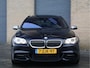 BMW 5-Serie Touring M550d xDrive M Sport | HUD | ACC | Harman/Kardon | Softclose | Pano | Comfortstoelen |