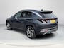 Hyundai Tucson 1.6 T-GDI PHEV Premium 4WD | Lederen bekleding | Stoel- en stuurverwarming | 4WD | Navigatiesysteem | Climate Control | Adaptieve Cruise Control | Plug In hybride | Full options | Resterende fabrieksgarantie | Rijklaarprijs |