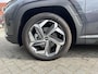 Hyundai Tucson 1.6 T-GDI PHEV Premium 4WD | Lederen bekleding | Stoel- en stuurverwarming | 4WD | Navigatiesysteem | Climate Control | Adaptieve Cruise Control | Plug In hybride | Full options | Resterende fabrieksgarantie | Rijklaarprijs |